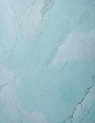 The primary subject of the image is a blue marble wall with a pattern of white and blue swirls. The setting is a room with a blue marble wall, and the visual style is a photo. The dominant colors are blue and white, creating a calm and serene atmosphere.