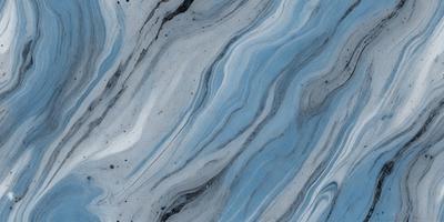 The primary subject of the image is a close-up of a marble-like surface with a blue and white color scheme. The setting is a patterned surface, possibly a marble or stone countertop. The visual style appears to be a close-up of a textured surface, possibly a marble or stone countertop. The colors and mood of the image are predominantly blue and white, creating a calm and elegant atmosphere.