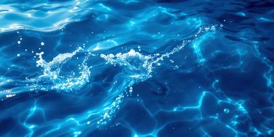 The primary subject of the image is a body of water, possibly a swimming pool, with a blue color. The setting is a clear blue water surface, and the visual style appears to be a photo. The colors and mood of the image are predominantly blue, creating a calm and serene atmosphere.