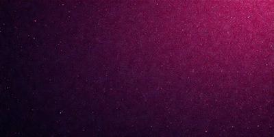 The primary subject of the image is a purple background with a pinkish hue. The setting is a dark, possibly indoor environment. The visual style is a close-up of the purple background, which gives the image a moody and dramatic appearance. The colors and mood of the image are predominantly dark and mysterious, with the purple and pinkish hues creating a striking contrast against the darker background.