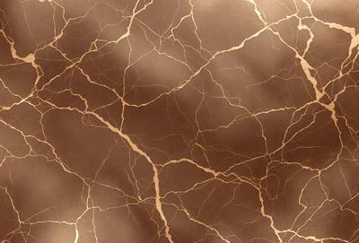 The primary subject of the image is a close-up of a marble surface with a gold-like texture. The setting is a room with a brown background. The visual style is a photo of the marble surface, showcasing its unique texture and color. The colors and mood of the image are warm and elegant, with the gold-like texture adding a touch of luxury and sophistication.