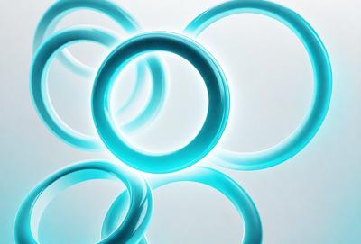 The primary subject of the image is a collection of blue rings, which are arranged in a circular pattern. The setting is a white background, which provides a clean and minimalist appearance. The visual style is a close-up of the rings, showcasing their vibrant blue color. The overall atmosphere is one of simplicity and elegance, with the blue rings as the main focus of the image.