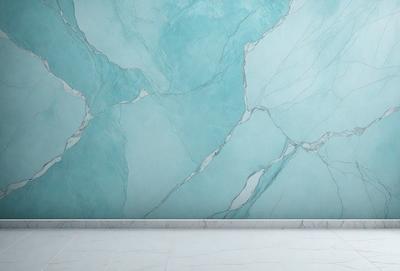 The primary subject of the image is a blue marble wall with a pattern of white and blue swirls. The setting is a bathroom, and the visual style is a photo. The dominant colors are blue and white, creating a calm and soothing atmosphere.