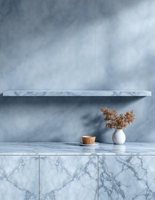 The primary subject of the image is a cup placed on a marble countertop. The setting is a kitchen, with a marble wall and a shelf above the counter. The visual style is a photo, and the colors and mood are predominantly white, giving the scene a clean and elegant appearance.
