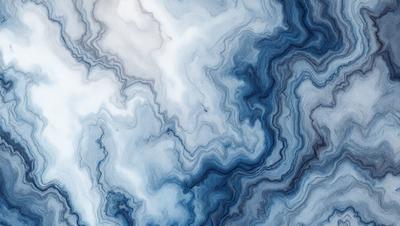The primary subject of the image is a blue and white marbled pattern, which is the main object, scene, or focus of the image. The setting or background features a blue and white marbled surface, which is the environment, backdrop, or surface visible in the image. The visual style of the image is a photo, as it is a real-life photograph of the marbled surface. The colors and mood of the image are predominantly blue and white, creating a calm and serene atmosphere.