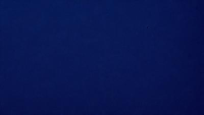 The primary subject of the image is a blue sky with no clouds. The setting is a vast, open space with no visible landmarks or objects. The visual style is a simple, clean, and minimalistic representation of the sky. The colors and mood convey a sense of calmness and tranquility.