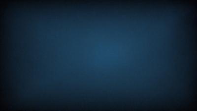 The primary subject of the image is a blue sky with no clouds. The setting is a dark blue background, which creates a contrast with the sky. The visual style is a photo, capturing the beauty of the clear blue sky. The colors and mood of the image are serene and peaceful, as the sky is void of any disturbances.