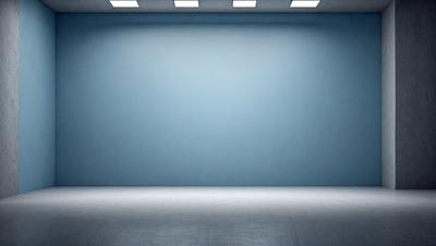 The primary subject of the image is a large, empty room with a blue wall. The setting is a spacious, unoccupied space, and the visual style is a photo. The room has a blue color scheme, which gives it a calm and serene atmosphere.