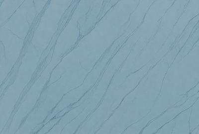 The primary subject of the image is a blue marble wall with a pattern of white streaks. The setting is a room with a blue background. The visual style is a close-up of the marble wall, showcasing its unique texture. The colors and mood of the image are predominantly blue, with the white streaks adding a touch of contrast and interest to the overall design.