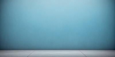 The primary subject of the image is a blue wall. The setting is a room with a blue wall, and the visual style is a photo. The dominant colors are blue and white, creating a calm and serene atmosphere.