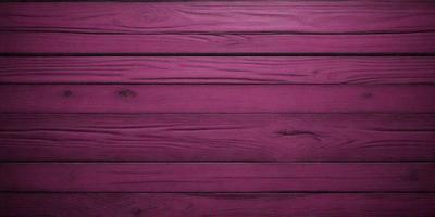 The primary subject of the image is a wooden wall with a purple color. The setting is a room with a wooden surface, and the visual style is a close-up of the wooden wall. The dominant colors are purple and brown, creating a warm and cozy atmosphere.