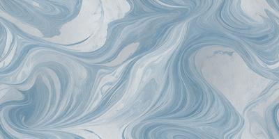 The primary subject of the image is a blue and white marbled wallpaper with a pattern of waves. The setting is a room with a blue and white marbled wallpaper, which creates a serene and calming atmosphere. The visual style is a close-up of the wallpaper, showcasing the intricate design and texture. The colors and mood of the image are predominantly blue and white, giving it a clean and soothing appearance.