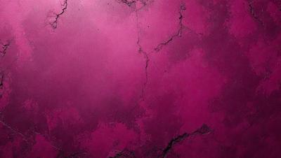 The primary subject of the image is a close-up of a purple wall with a pinkish hue. The setting is a room with a purple wall, and the visual style appears to be a photo. The dominant colors in the image are purple and pink, creating a warm and inviting atmosphere.