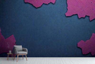 The primary subject of the image is a chair placed in a room with a blue wall. The setting is a living room, and the visual style is a photo. The dominant colors are blue and purple, creating a calm and relaxing atmosphere.