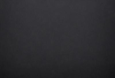 The primary subject of the image is a black background. The setting is a dark, empty space with no visible objects or details. The visual style is a simple, monochromatic design. The colors and mood are predominantly dark and moody, creating a sense of mystery or drama.