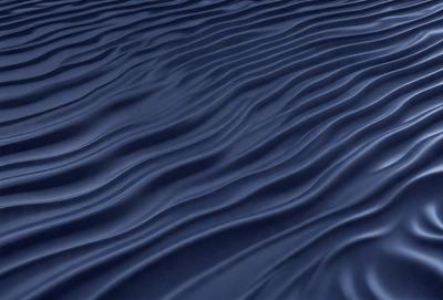 The primary subject of the image is a large body of water, which appears to be a deep blue ocean. The setting is a vast expanse of water, with no visible land or other objects in the background. The visual style of the image is a close-up of the water, showcasing its depth and texture. The colors and mood of the image are predominantly blue, creating a serene and calming atmosphere.