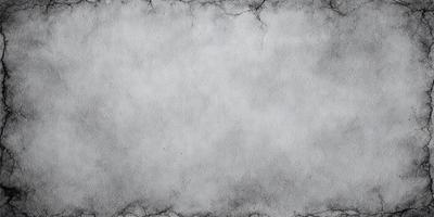 The primary subject of the image is a white background with a few black spots. The setting is a white sheet of paper, and the visual style is a close-up of the paper. The colors and mood of the image are predominantly white and black, creating a stark and minimalist appearance.