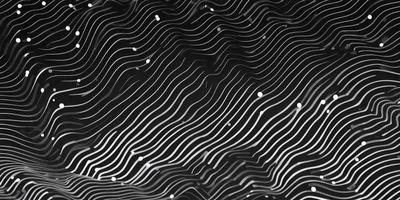 The primary subject of the image is a black and white pattern, which appears to be a digital art or illustration. The setting is a dark background, and the visual style gives the impression of a textured surface. The dominant colors are black and white, creating a moody and dramatic atmosphere.