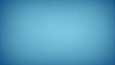 The primary subject of the image is a large, empty blue sky. The setting is a vast, open space with no visible landmarks or objects. The visual style is a simple, clean blue background, which creates a calm and serene atmosphere.