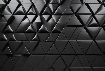 The primary subject of the image is a black and white patterned wall. The setting is a black background, and the visual style is a patterned wall. The dominant colors are black and white, creating a bold and striking atmosphere.