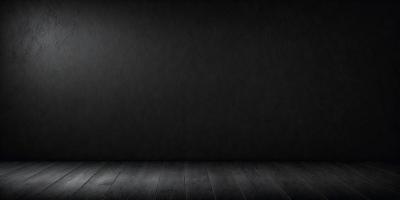 The primary subject of the image is a wooden floor with a black background. The setting is a dark room, and the visual style is a black and white photo. The colors and mood of the image are predominantly dark and moody, creating a sense of mystery or drama.