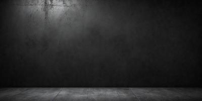 The primary subject of the image is a black wall with a gray background. The setting is a room with a black wall, and the visual style is a photo. The dominant colors are black and gray, creating a moody atmosphere.