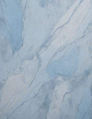 The primary subject of the image is a blue marble wall with a pattern of swirls and curves. The setting is a room with a blue marble wall, and the visual style is a photo. The dominant colors are blue and white, creating a calm and serene atmosphere.