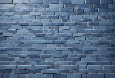 The primary subject of the image is a blue brick wall. The setting is a brick wall, and the visual style is a photo. The dominant colors are blue and white, creating a calm and serene atmosphere.