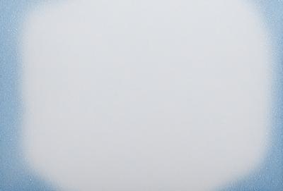 The primary subject of the image is a white, cloudy sky. The setting is a vast, open space with no visible landmarks or objects. The visual style is a photo, capturing the natural beauty of the cloudy sky. The colors and mood of the image are predominantly white, giving it a serene and peaceful atmosphere.