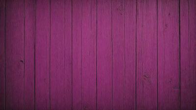 Purple wall with wood grain texture.