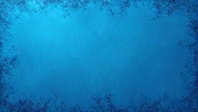 The primary subject of the image is a blue sky with a few white clouds. The setting is a clear day with a blue sky as the backdrop. The visual style is a photo of the sky, showcasing the beauty of the natural environment. The colors and mood of the image are predominantly blue, creating a serene and peaceful atmosphere.