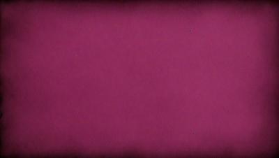 The primary subject of the image is a large, pink surface. The setting is a room with a pink wall, and the visual style is a close-up of the pink wall. The colors and mood of the image are predominantly pink, creating a warm and inviting atmosphere.