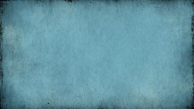 The primary subject of the image is a blue background with a texture that resembles a piece of fabric. The setting is a large, empty space with no visible objects or people. The visual style is a close-up of the blue fabric, which gives the image a unique and artistic appearance. The colors and mood of the image are predominantly blue, creating a calm and serene atmosphere.