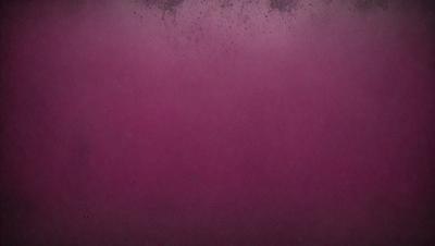 The primary subject of the image is a close-up of a pink surface, which appears to be a wall or a piece of fabric. The setting is indoors, with the pink surface being the main focus of the image. The visual style is a close-up, which emphasizes the pink color and texture of the surface. The colors and mood of the image are predominantly pink, creating a warm and inviting atmosphere.