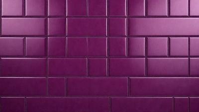 Purple tiles on a wall.