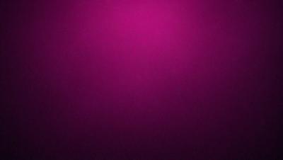 The primary subject of the image is a purple wall. The setting is a room with a purple wall, and the visual style is a close-up of the wall. The dominant colors in the image are purple, and the overall atmosphere is calm and serene.