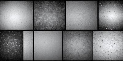The image is a collage of four different pictures of the same surface. The surface appears to be a combination of black and white, with some gray tones. The primary subject of the image is the surface, which is the main focus of each of the four pictures. The setting/background is the same for each picture, showcasing the same surface. The visual style of the image is a collage, with each picture featuring a different composition. The colors and mood of the image are predominantly black and white, with some gray tones, creating a somewhat moody atmosphere.
