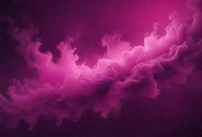 The primary subject of the image is a purple smoke or mist, which appears to be a digital art or illustration. The setting is a dark background, and the visual style gives the impression of a surreal or dreamy atmosphere. The dominant colors are purple and pink, creating a moody and mysterious mood.