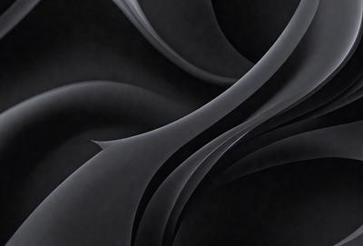 The primary subject of the image is a black and white photograph of a spiral pattern. The setting is a dark background, which contrasts with the spiral pattern. The visual style is a black and white photo, giving it a classic and timeless appearance. The colors and mood of the image are predominantly dark and moody, with the spiral pattern being the main focal point.
