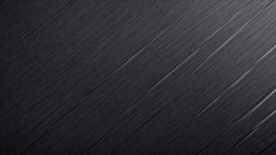The primary subject of the image is a black background with a white line running through it. The setting is a dark room, and the visual style is a black and white photo. The colors and mood of the image are predominantly dark and moody, with the white line adding a touch of contrast.