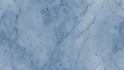 The primary subject of the image is a blue marble wall with a pattern of white spots. The setting is a room with a blue marble floor. The visual style is a close-up of the marble wall, showcasing its unique texture and design. The colors and mood of the image are predominantly blue, with the white spots adding a touch of contrast and interest to the overall appearance.