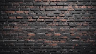 The primary subject of the image is a brick wall. The setting is a brick wall with a brick pattern, and the visual style is a photo. The colors and mood of the image are predominantly dark, with the brick wall being the main focus.
