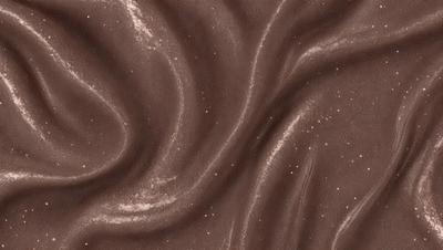 The primary subject of the image is a brown fabric with a pattern of swirls and stars. The setting is a close-up view of the fabric, showcasing its intricate design. The visual style is a combination of a photo and digital art, as the fabric appears to be a blend of natural and artificial elements. The colors and mood of the image are warm and inviting, with the brown fabric and swirls creating a sense of depth and texture.