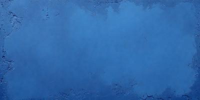 The primary subject of the image is a large, blue, textured surface. The setting is a dark, blue room with a blue sky visible in the background. The visual style is a combination of a photo and a digital art, creating a unique and intriguing atmosphere. The dominant colors are blue, with a few hints of white and gray, giving the image a calm and serene mood.