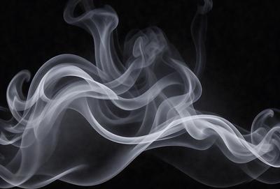 The primary subject of the image is a cloud of smoke, which is the main object, scene, or focus of the image. The setting is a black background, which provides a stark contrast to the smoke. The visual style is a photo, capturing the smoke as it billows and swirls in the air. The colors and mood of the image are predominantly dark and moody, with the smoke creating a dramatic and atmospheric scene.
