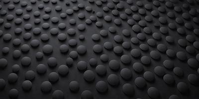 The primary subject of the image is a black and white pattern of circles. The setting is a black background, and the visual style appears to be a digital art or illustration. The dominant colors are black and white, creating a bold and striking pattern. The overall atmosphere of the image is modern and visually appealing.