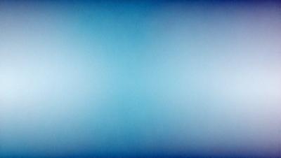 The primary subject of the image is a large, empty blue sky. The setting is a vast, open space with no visible landmarks or objects. The visual style is a simple, clean blue background, which gives the image a calm and serene atmosphere.