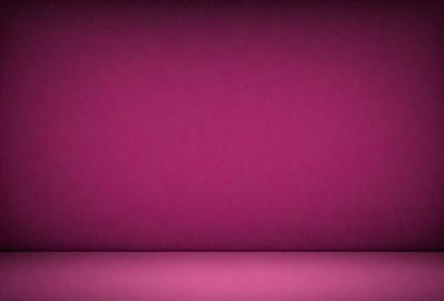 The primary subject of the image is a large, pink wall. The setting is a room with a pink background, and the visual style is a close-up of the wall. The dominant colors in the image are pink, and the overall atmosphere is warm and inviting.