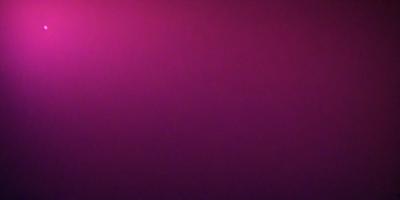 The primary subject of the image is a purple wall. The setting is a room with a purple wall, and the visual style is a close-up of the wall. The colors and mood of the image are predominantly purple, creating a calm and serene atmosphere.