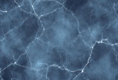 The primary subject of the image is a blue and white marbled wall. The setting is a room with a blue and white marbled wall as the main focus. The visual style is a close-up of the marbled wall, showcasing its intricate patterns. The colors and mood of the image are predominantly blue and white, creating a calm and serene atmosphere.